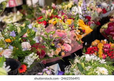 Many different bouquets of flowers on a stand in a flower shop. Presentation. Flower mix background. Beautiful flowers,florist shop bouquets background,different types of flowers in bouquet - Powered by Shutterstock