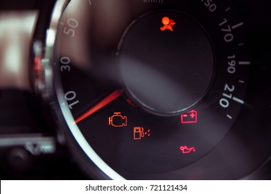 Many different car dashboard lights in closeup