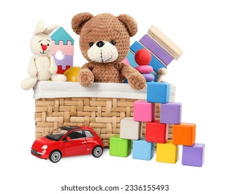 Many different children's toys and wicker basket isolated on white - Shutterstock ID 2336155493