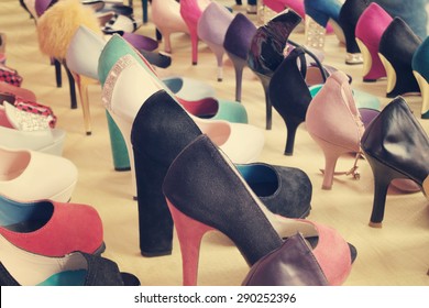 Many Different Colorful Shoes At Market