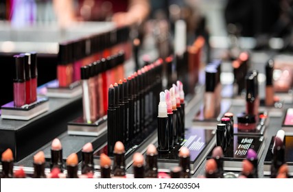 Many Different Cosmetics On Shelves In Beauty Store