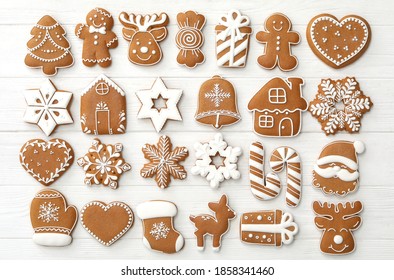 Many different delicious Christmas cookies on white wooden table, flat lay - Powered by Shutterstock