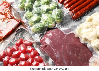 Many different food in vacuum packings as background, closeup