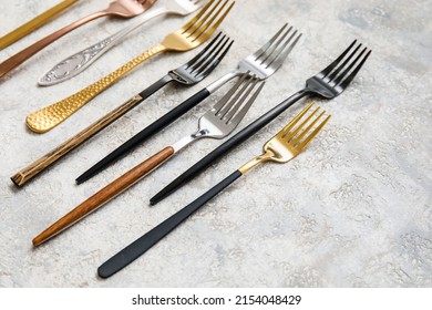 Many Different Forks On Light Background