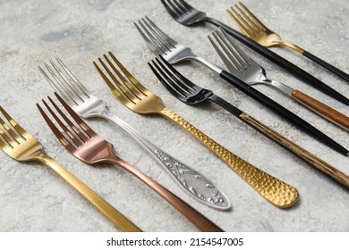 Many Different Forks On Light Background