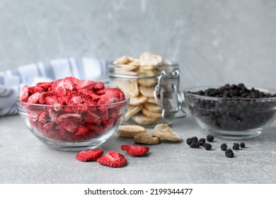 Many different freeze dried fruits on light grey table