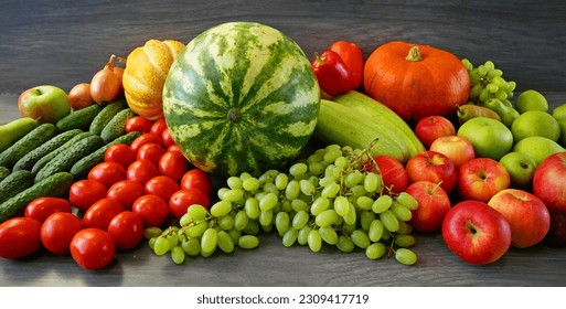 many different fruit and vegetables, green grocery shop, healthy fresh colored fruits and vegetables background delivery concept - Powered by Shutterstock