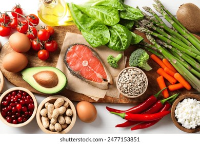 Many different healthy food on white table, flat lay