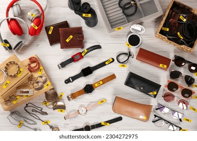 Many different items on white wooden table, flat lay. Garage sale - Shutterstock ID 2304272975