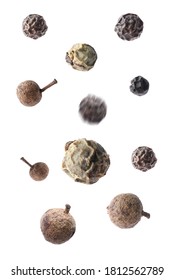 Many Different Peppercorns Falling On White Background