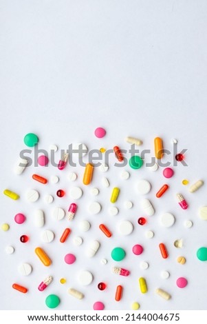 Many different pills on white background, flat lay.Global Pharmaceutical Industry and Medicinal Products - Colorful Pills, Tablets and Capsules, medicine and drug concept