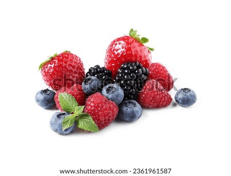Many different ripe berries and mint leaves isolated on white