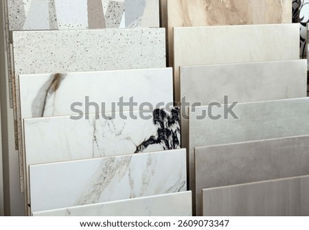 Many different samples of tiles on display in store