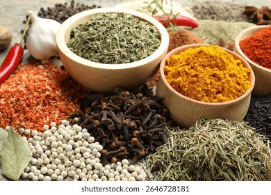 Many different spices on table, closeup view