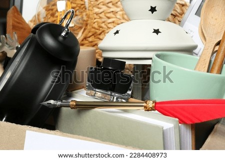 Many different stuff, closeup view. Garage sale