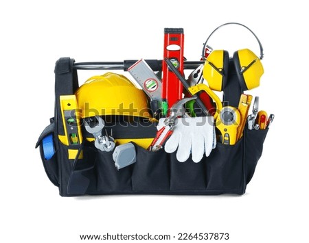 Many different tools in box isolated on white