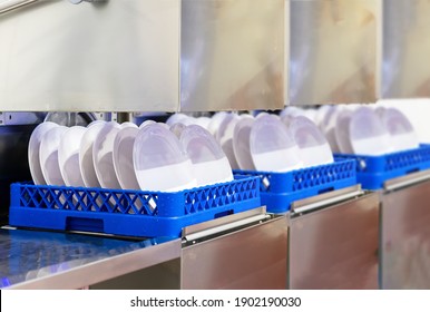 Many Dish Or White Plate Arranged On Basket For Cleaning By Automatic Dishwasher Machine In Kitchen Room Restaurant