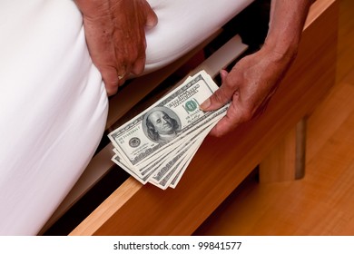 Many Dollar Bills Are Hidden Under The Bed