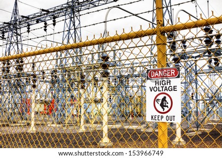 Many electrical substations have fences and warning signs to keep out.
