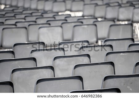 Many empty chairs without audience detail