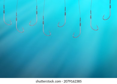 Many Empty Fish Hooks Hanging In Deep Blue Water