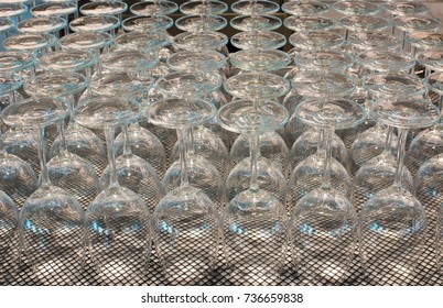 Many empty wine glasses.