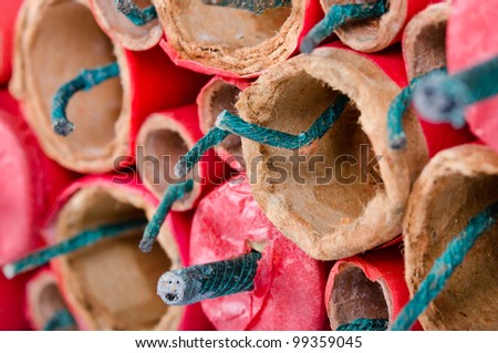 many firecracker with fuse about one another as a close-up