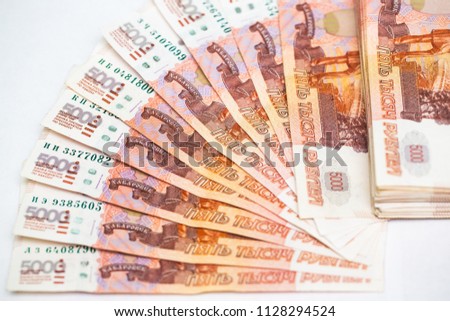 Many five thousandth notes. Russian rubles. Fan of money