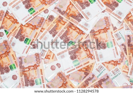 Many five thousandth notes. Russian rubles. Background of money
