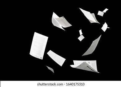 Many flying business documents isolated on black background Papers flying in air in business concept - Shutterstock ID 1640175310