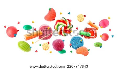 Many flying candies on white background