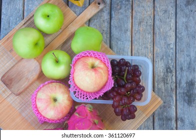 many fruit : apple,grape and dragon fruit