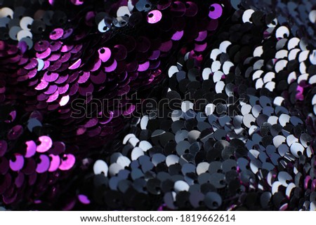 Many fuchsia sequins shining background