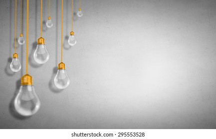 Many Glass Light Bulbs Hanging From Above