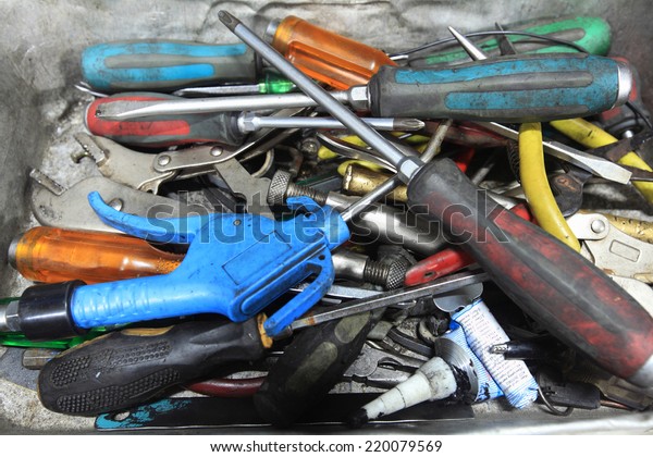 Many hand tools in car\
garage