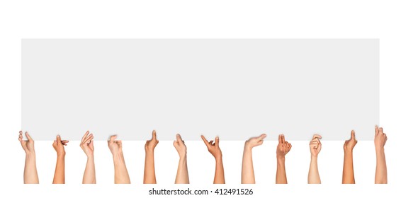 Many Hands Holding A Blank Poster For Advertising On An Isolated White Background