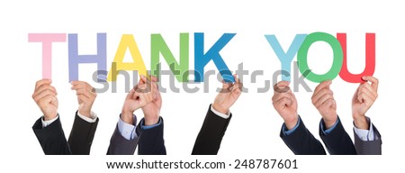 Many Hands Holding The Colorful Word Thank You Over White Background
