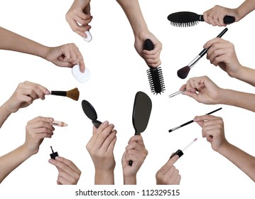 Many Hands Holding Different  Make Up Equipment Cut Out On White Background