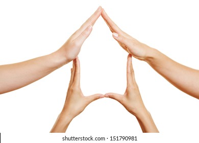 Many hands at home forming a house shape