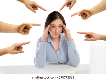 Many Hands Pointing The Overwhelmed Woman That Is Suffering  Mobbing In The Workplace 