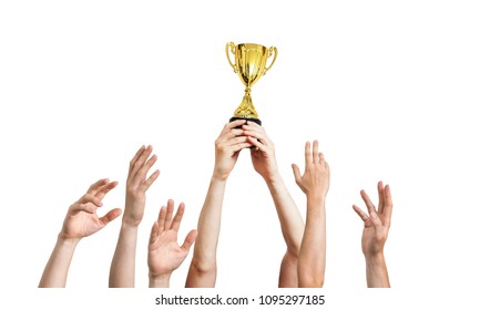 Many Hands Raised Up. Winner Is Holding Trophy In Hands. Isolated On White Background.