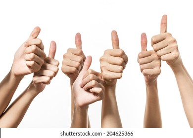 many hands thumbs up showing the success of teamwork - Shutterstock ID 204625366
