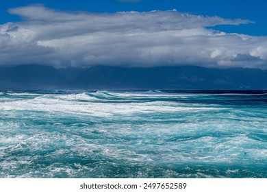 Many hues of blue on the coastline at Ho'okipa Beach Park on Maui, Hawaii - Powered by Shutterstock