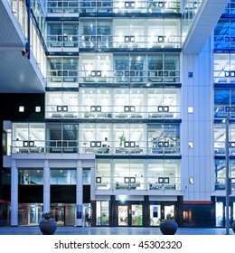 Many Identical Empty Office Cubicles In A Large Office Buildionmg.