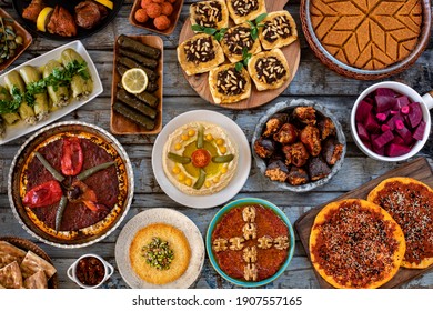 Many kinds of foods and appetizer on the dining table. Fasting concept with iftar table. Traditional foods concept. 