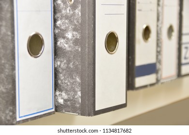 Many Lever Arch Files On A Bookshelves
