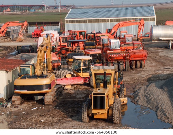 Many machinery\
parked in the construction\
site