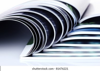 many magazines isolated on white