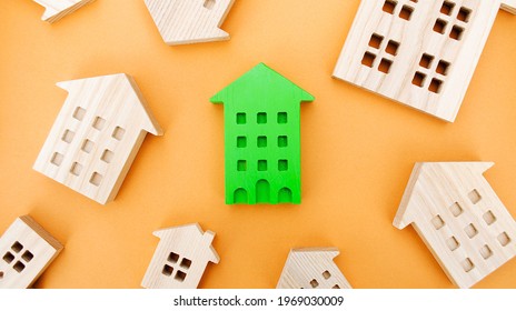 Many Miniature Wooden Houses. Real Estate Concept. Choose Affordable Housing. Buying And Selling Housing. Market Analytics.