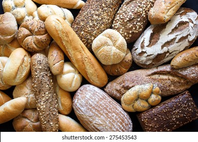 Many mixed breads and rolls shot from above. - Shutterstock ID 275453543